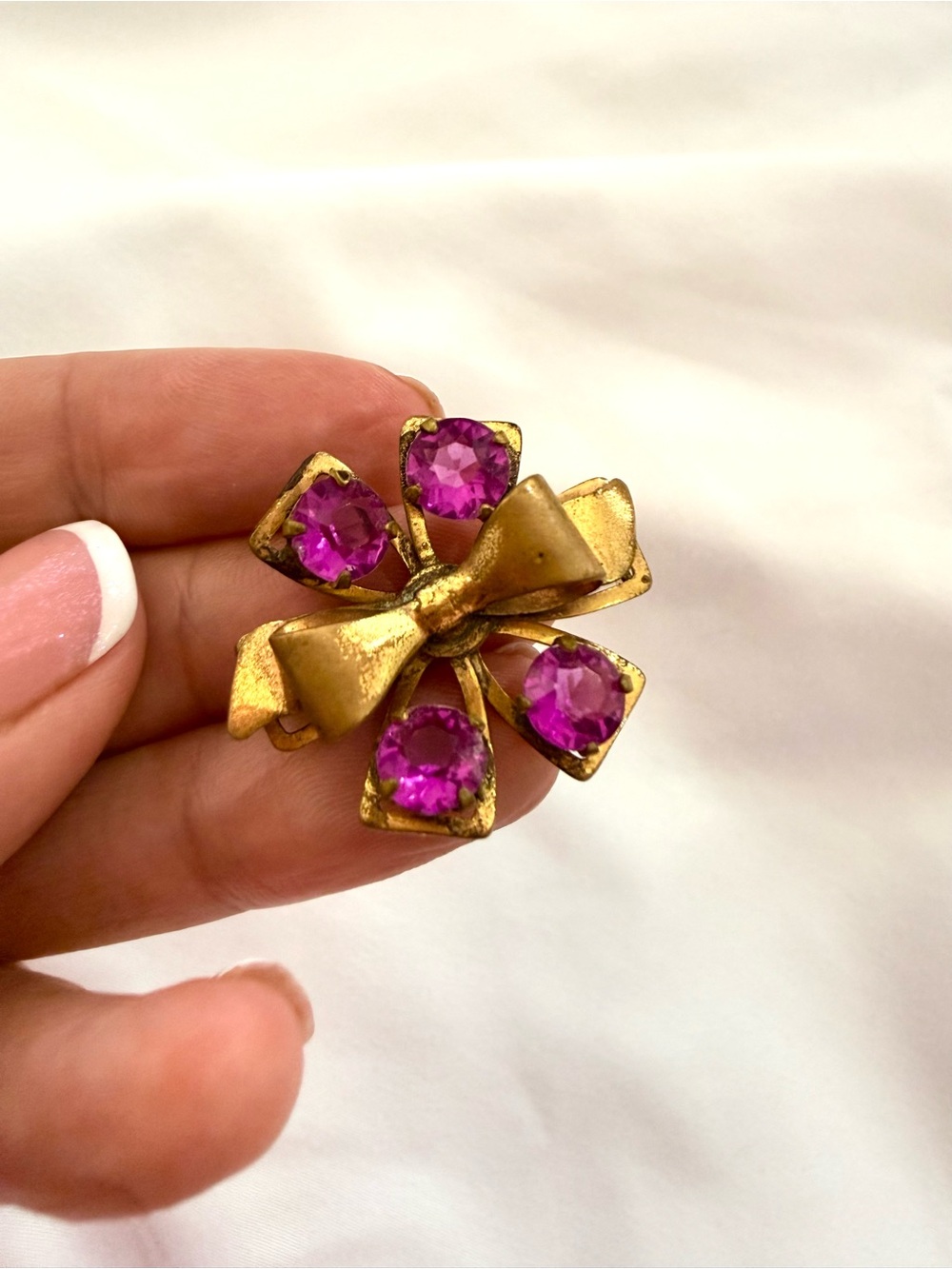 Gold Tone Bow Brooch with Pink Purple Stones